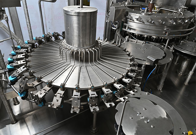 RINSING , FILLING & CAPPING MACHINE